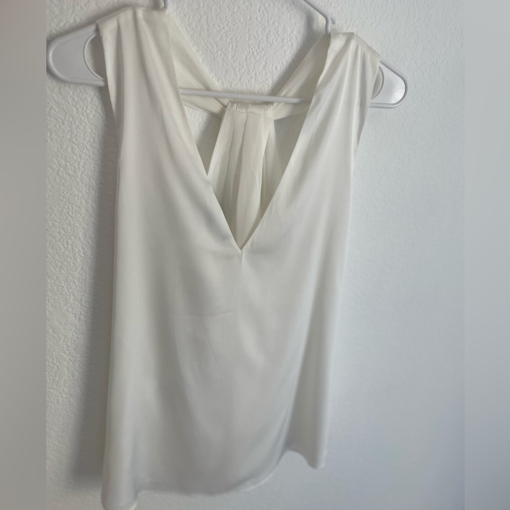 New White Blouse. Tags on. Size Small. Reversible.